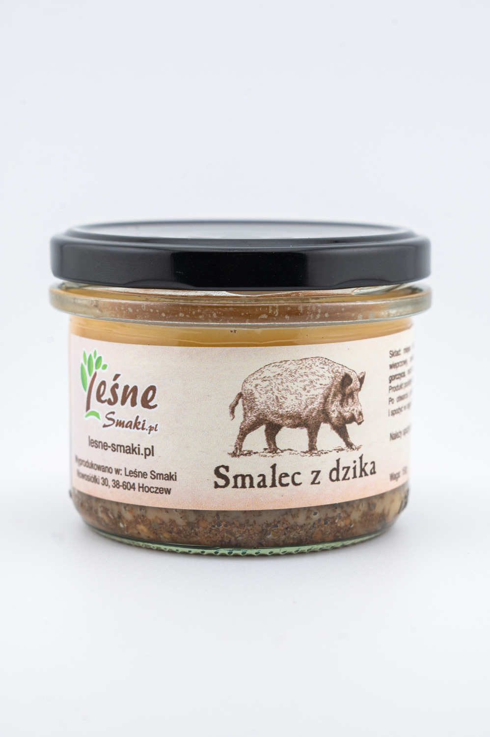 Słoik 235ml oklejony etykietą Leśnych Smaków ukazującą rzemieślniczy wyrób o nazwie smalec z dzika.